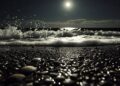 glass pebble beach at night