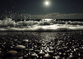 glass pebble beach at night
