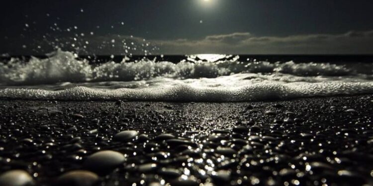 glass pebble beach at night