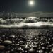glass pebble beach at night